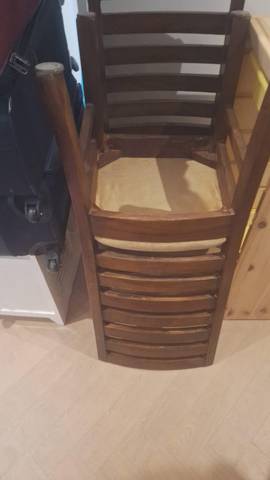 Wooden chair shown for collection as part of a local task in EAST MOLESEY KT8