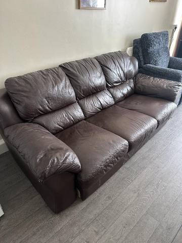 Large brown sofa shown for removal task in GREATER LONDON SW7