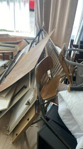 Dismantled furniture and wood waste for removal in Great Russell St, WC1B